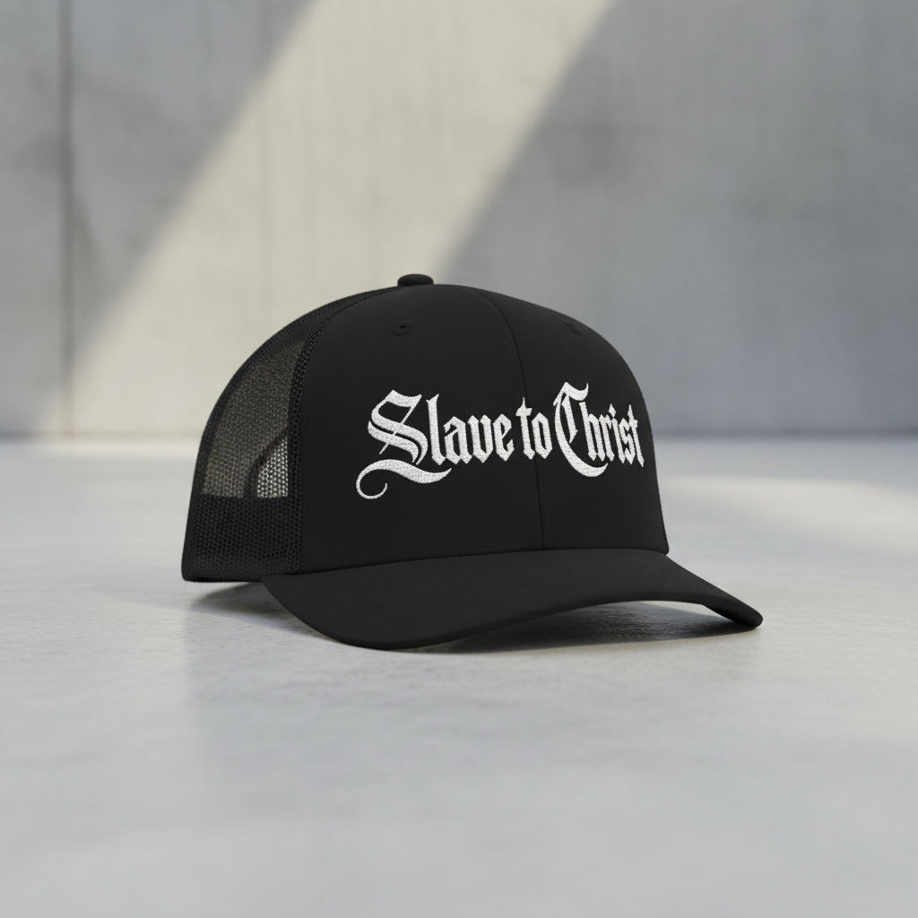 Slave to Christ black trucker hat, white blackletter embroidery on the front