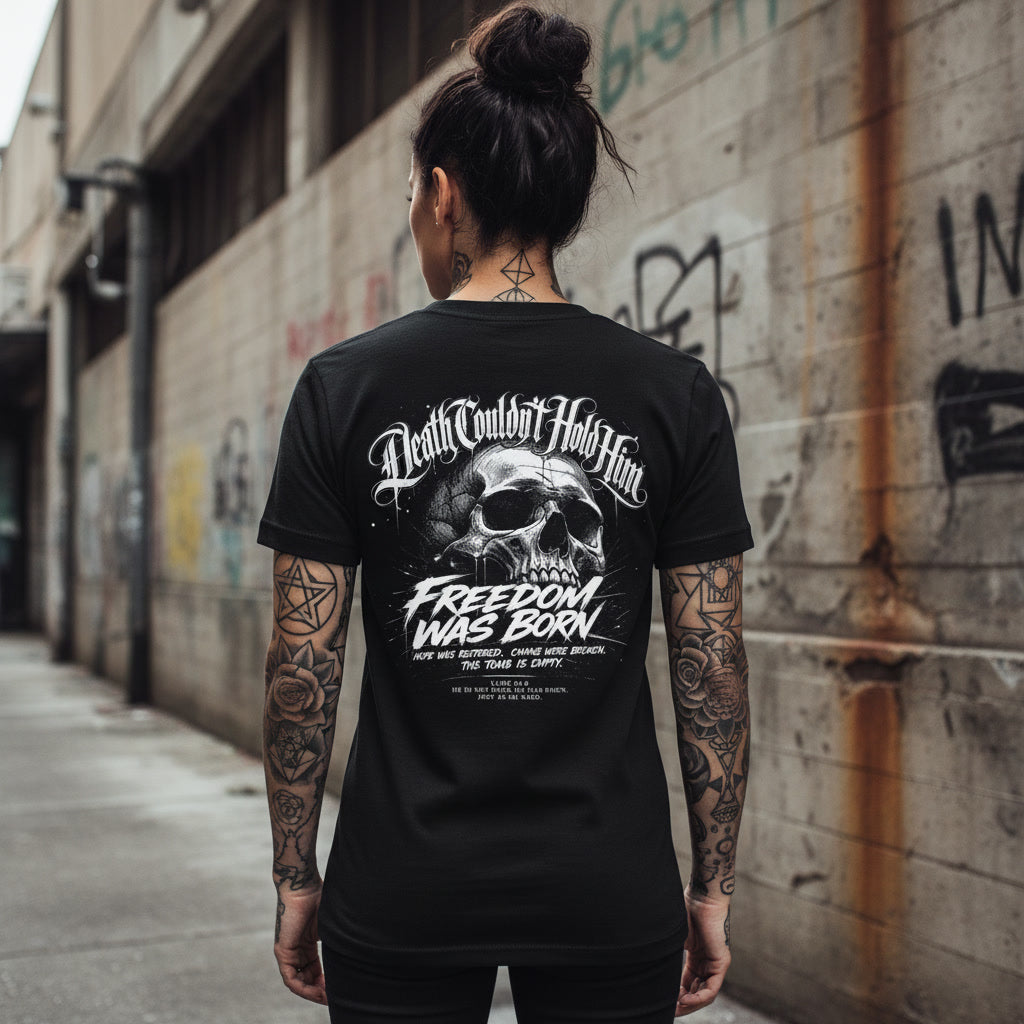 Black t-shirt showing the Death Couldn't Hold Him print in white blackletter